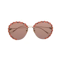 chloé eyewear lunettes de soleil rondes à détail de coutures - orange